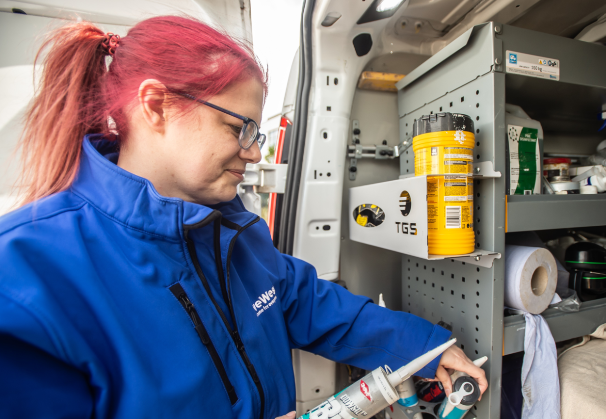 Jessica Donaldson looking at the tools in her LiveWest van,