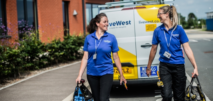 two tradeswomen walking