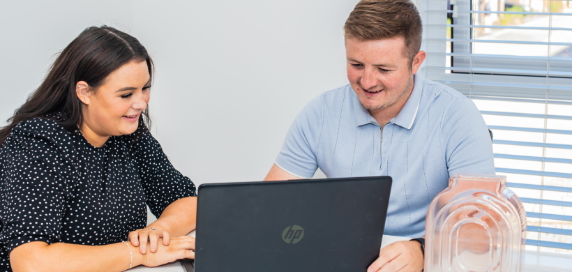 Customers using a laptop