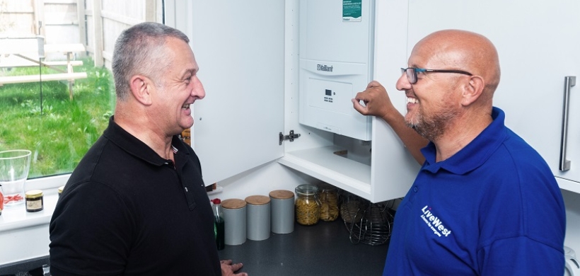 Mark Lamble (left) in his home at Applegate Park.