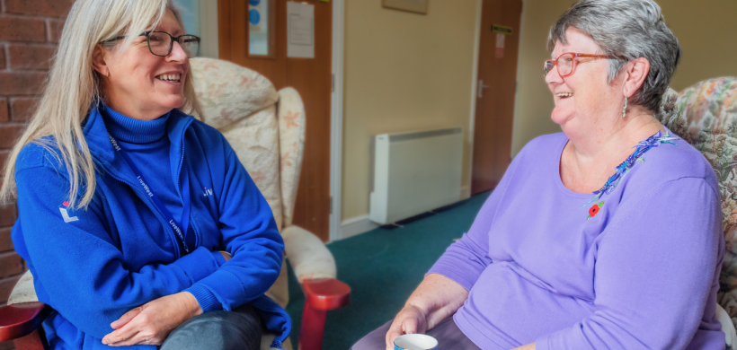 LiveWest colleague talking to one of our residents, Jenny, about her new windows.