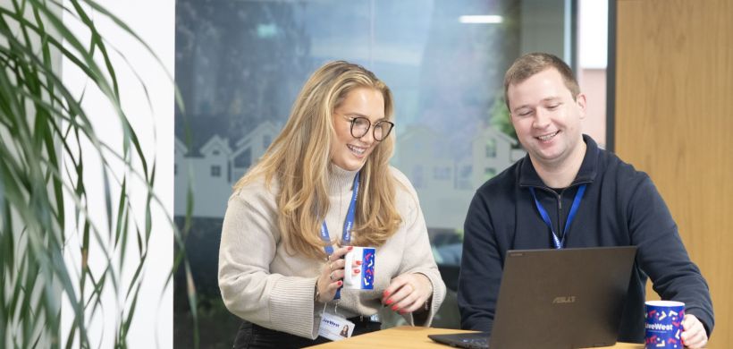 Colleagues laughing 