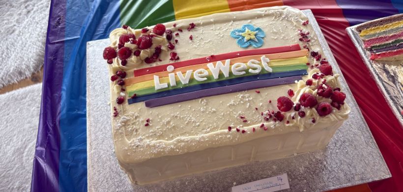 Pride cake with LiveWest logo
