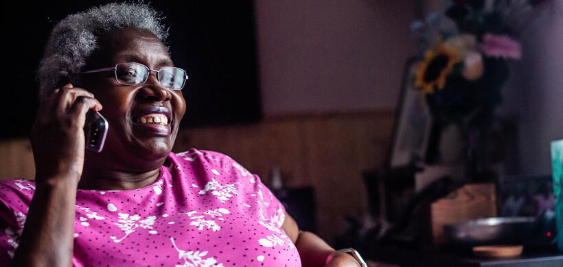 A LiveWest customer speaking on the phone.