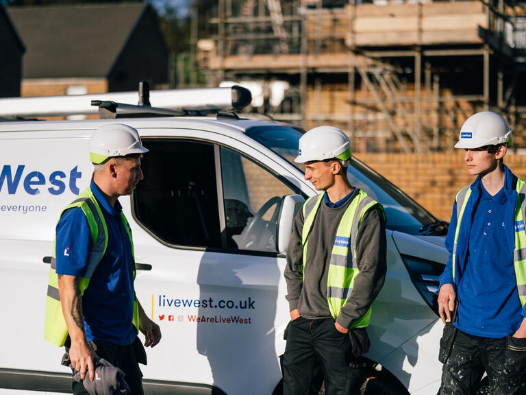 Toby Luce with two apprentices standing by a LiveWest