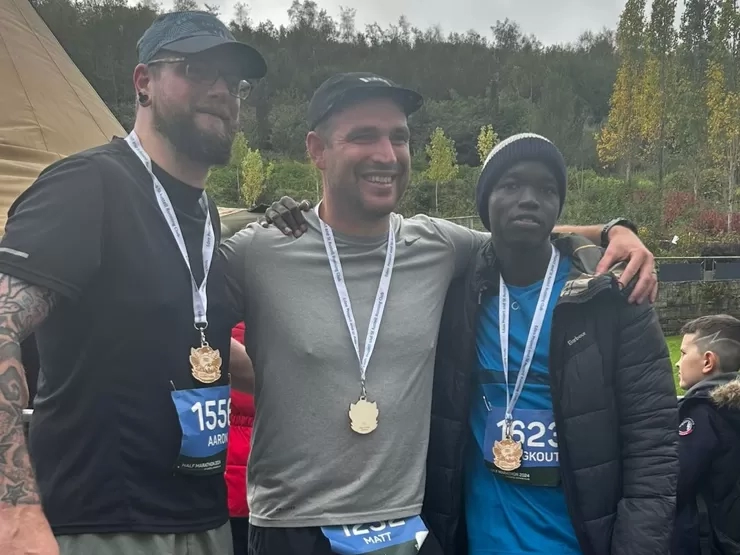 Aaron, Matt and Changkouth after completing a half marathon.