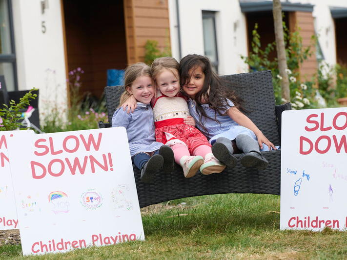 Young people who have been involved in helping create the 'slow down' signs.