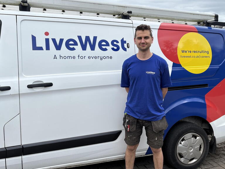 James stood in front of his LiveWest van.
