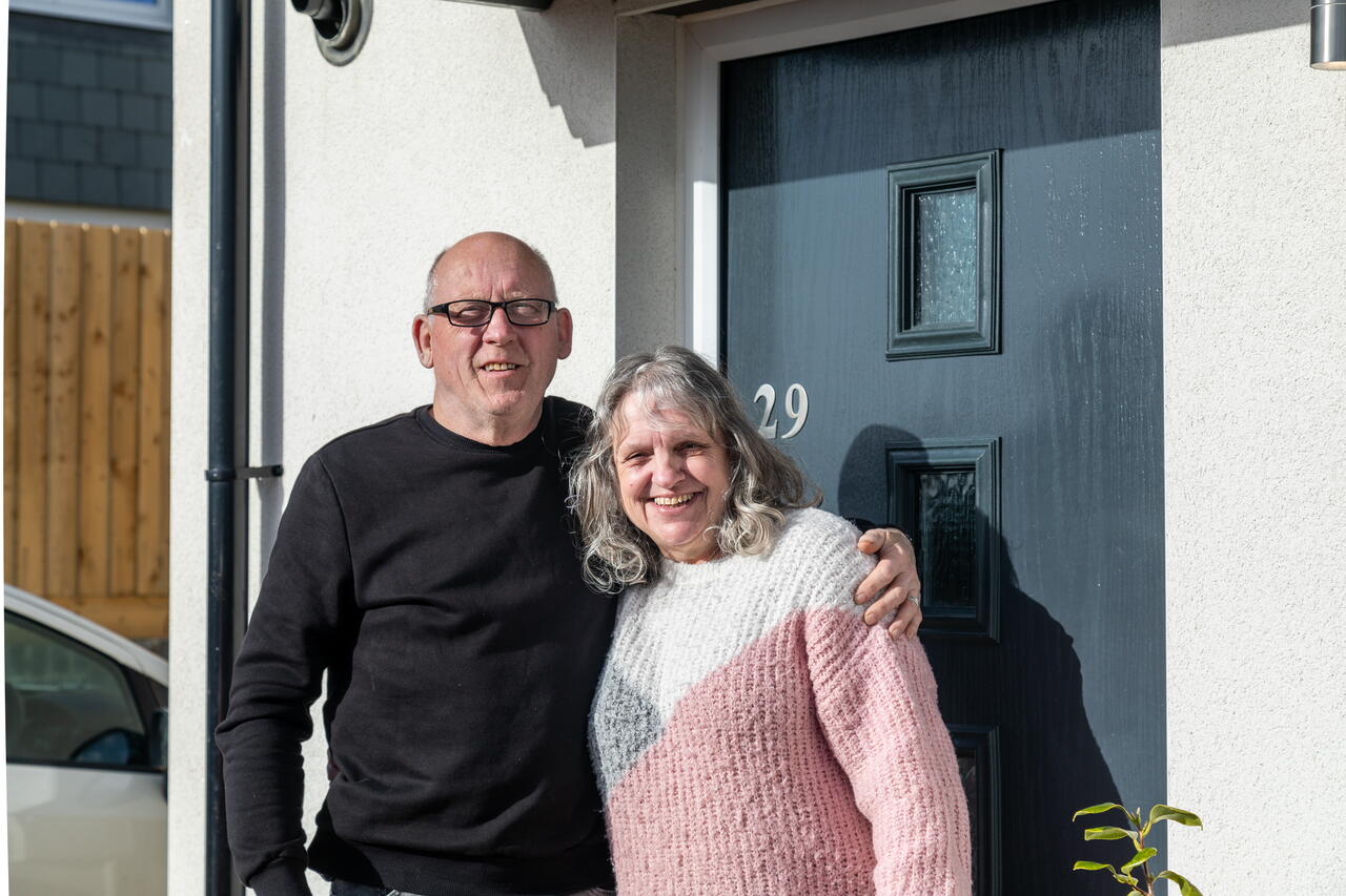 Image of Ann and Kev outside their new home in Bodmin