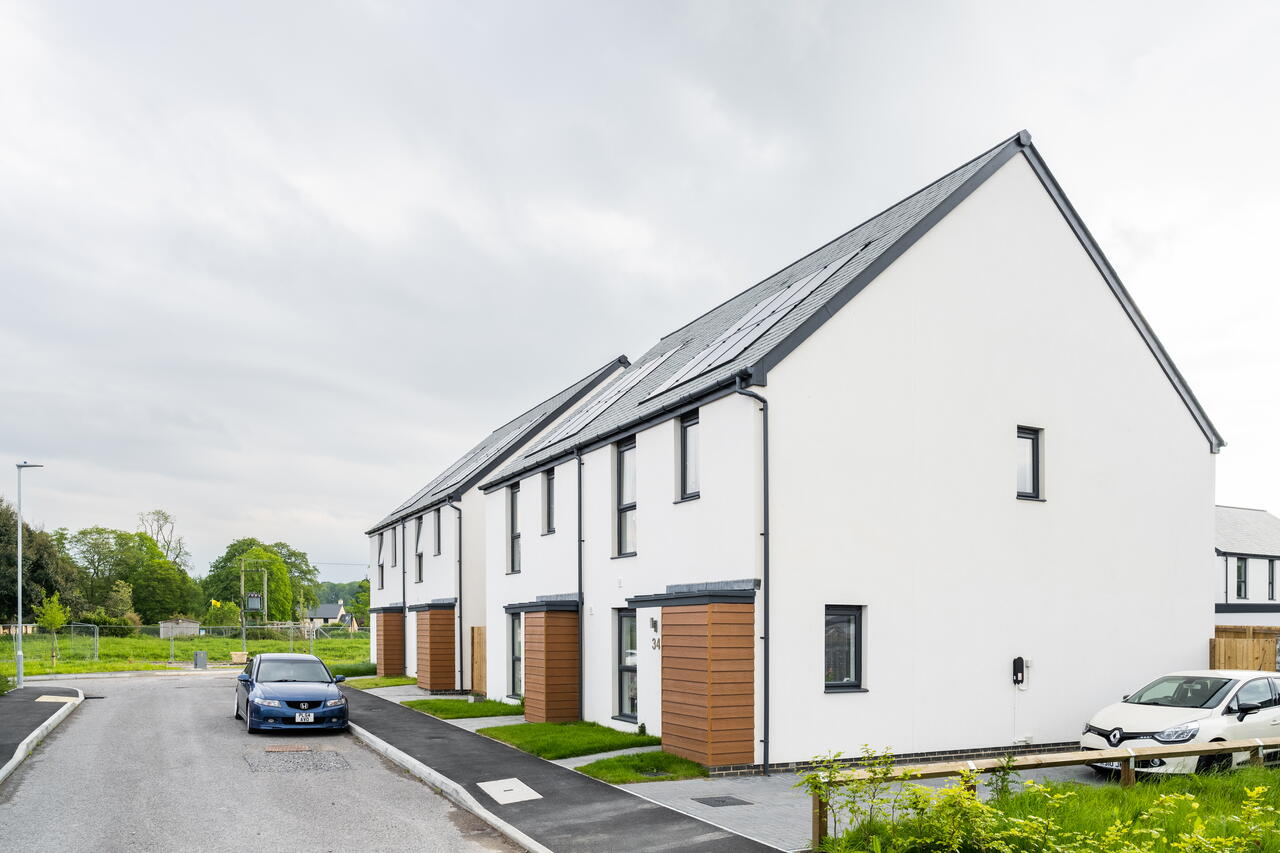 Image of LiveWest housing with greenery surrounding the houses
