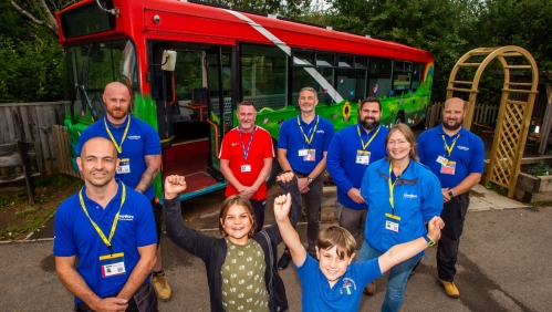 Volunteers with the upcycled bus