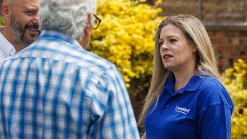 Colleague talking with customers