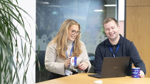 Colleagues laughing 