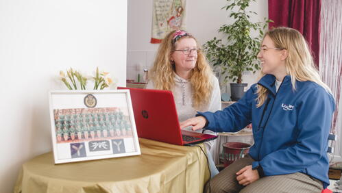 Image of LiveWest customer and colleague using the portal on a laptop