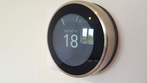 Image of a heating thermostat set at 18 degrees celcius.