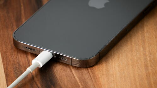 Image shows an iPhone on charge